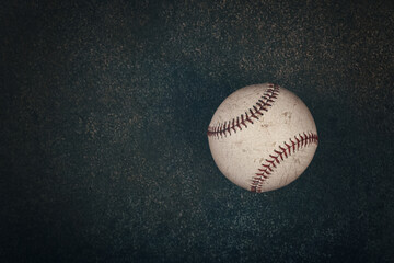 Close up one baseball ball on dark background