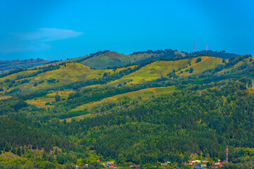 Naklejka premium Summer landscape with hills and mountains of the Altai.