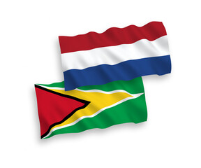Flags of Co-operative Republic of Guyana and Netherlands on a white background