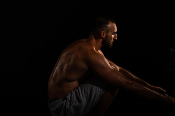 Fototapeta na wymiar Portrait of male exercising