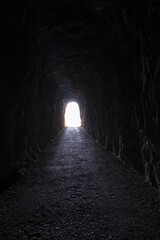 Obraz premium Dark tunnel in the stone