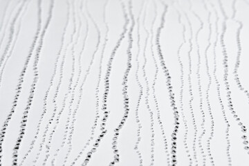 Texture of pierced paper. Simple dot pattern.