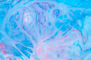 Fototapeta na wymiar Fluid Art. Abstract liquid paint textured background with decorative spirals and swirls. Liquid pink blue backdrop. Trendy wallpaper