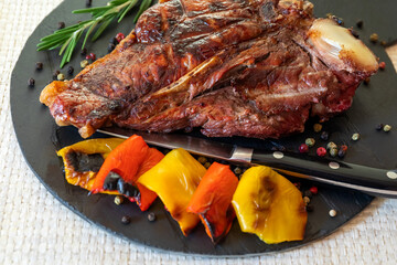Grilled steak, with spices and peppers. Ready to eat. Florentine steak