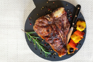 Grilled steak, with spices and peppers. Ready to eat. Florentine steak