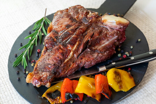 Grilled steak, with spices and peppers. Ready to eat. Florentine steak