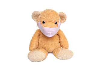 Teddy bear in a medical mask. Isolate on a white background.