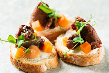 canape with beef and herbs