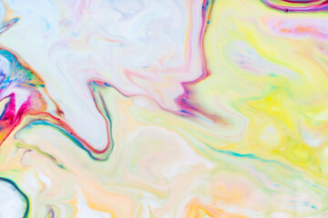 Fototapeta na wymiar Multicolored lines and spots on liquid surface. Abstract background made with fluid art technique. Trendy colorful backdrop. Fluid art
