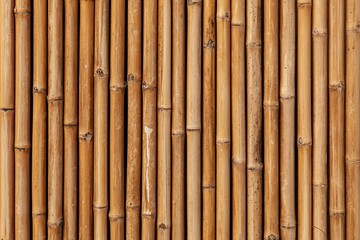 Naklejka premium Brown old Bamboo fence texture and background seamless