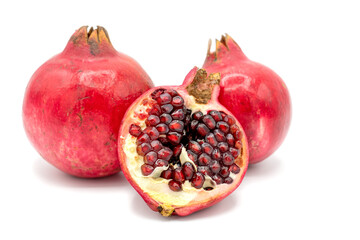 ripe fruit from pomegranate on white background