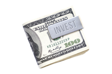 Silver money clip with word INVEST holding dollar bills. Dollars in money clip on the white background with copy space. Concept of money set aside to invest or grow money for future security. 