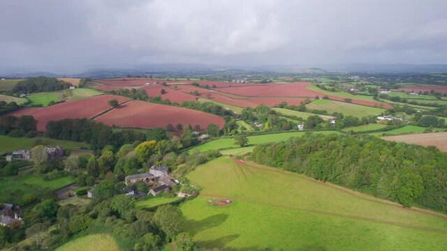 Fields over Compton Castle from a drone, Compton, Devon, England, Europe

