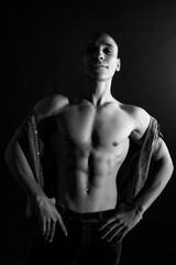 The muscular egyptian male on black background. Sexy naked torso. Sport workout bodybuilding concep. Muscular torso and chest. Isolated on black background.
