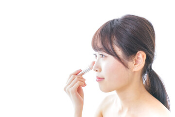 Obraz premium お化粧をする女性