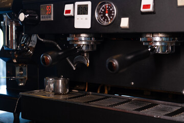Close-up of Espresso machine making coffee in pub, bar, restaurant. Professional coffee brewing. Coffee Shop Cafeteria Restaurant Service Concept.