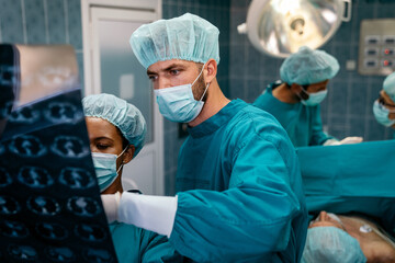 Team of surgeon at work on operating in hospital