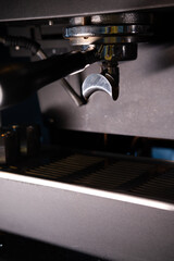 Fototapeta na wymiar Close-up of Espresso machine making coffee in pub, bar, restaurant. Professional coffee brewing. Coffee Shop Cafeteria Restaurant Service Concept.