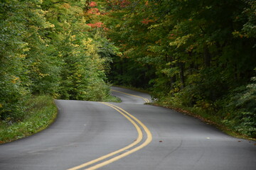 Fototapeta na wymiar The lake road in autumn, Saint-Aubert, Québec, Canada