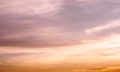 Reddish cloudy sky before the golden hour