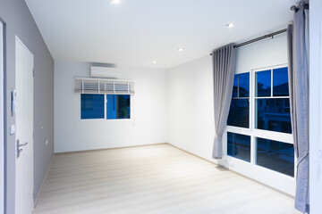 Empty room or bedroom in perspective. Interior inside house building with wooden floor or laminate, wall, door, window, adjusting vertical or venetian blind, eyelet curtain. Look modern for background