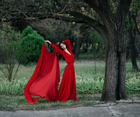 woman in red dress basing nature lifestyle summer