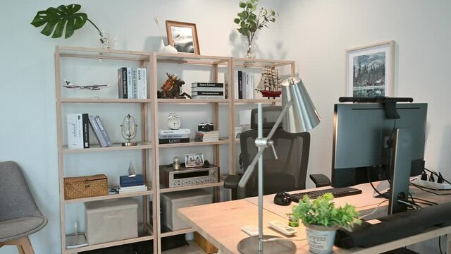 Set of computer on wooden desk with object decoration on wooden shelves, Workplace minimalist design