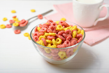 colored corn rings for breakfast on the table close-up