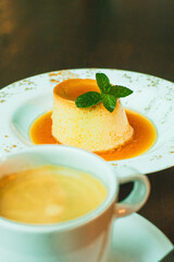 presentation of restaurant menu, homemade flan dessert with coffee
