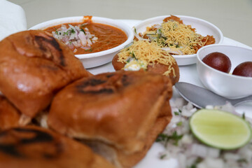 Traditional Tasty Pav Bhaji and Gulab Jamun. Favorite Indian Food.