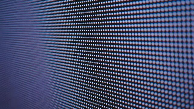 Extreme close-up shot  of bright colored LED SMD video wall with high saturated patterns 