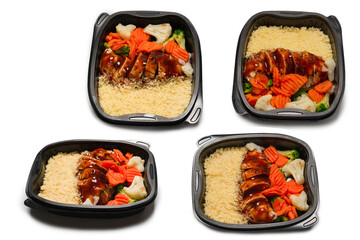Ready food in a container. Stewed chicken in teriyaki sauce, stewed carrot, cabbage and porridge.