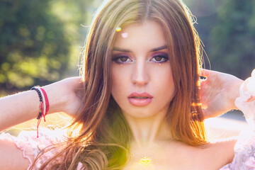 Fairy make up shoot outdoor in the woods. Pink make up close up shoot at golden hour
