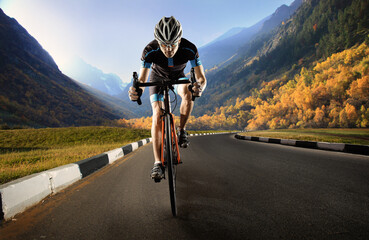 Sport. The cyclist rides. Autumn background.