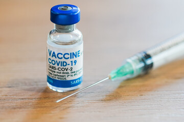 Covid-19 Corona Virus 2019-ncov vaccine vials medicine drug bottles syringe injection. Vaccination, immunization, treatment to cure Covid 19 Corona Virus infection. Healthcare And Medical concept.