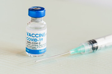 Covid-19 Corona Virus 2019-ncov vaccine vials medicine drug bottles syringe injection. Vaccination, immunization, treatment to cure Covid 19 Corona Virus infection. Healthcare And Medical concept.