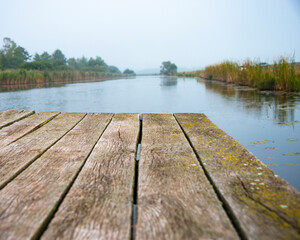 Old wooden pier on river nature beauty of silence