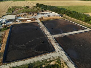 Basin or tank sedimentation tanks. Aerial top view of round polls in wastewater treatment plant,...