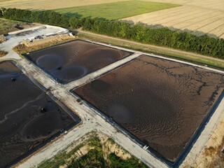 Basin or tank sedimentation tanks. Aerial top view of round polls in wastewater treatment plant,...