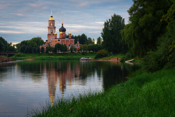 Resurrection Cathedral on the bank of the Polist River in the cloudy summer day, Staraya Russa,...