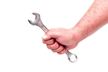 studio lighting. a human hand. wrench on a white background