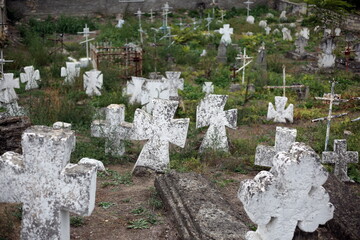 Old crosses and monuments in the cemetery.
Unknown graves