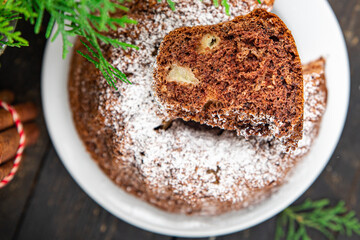 christmas cake homemade cakes sweet dessert christmas card new year sponge cake chocolate spicy aroma of ginger, cinnamon, vanilla, anise holiday gift food background rustic top view copy space