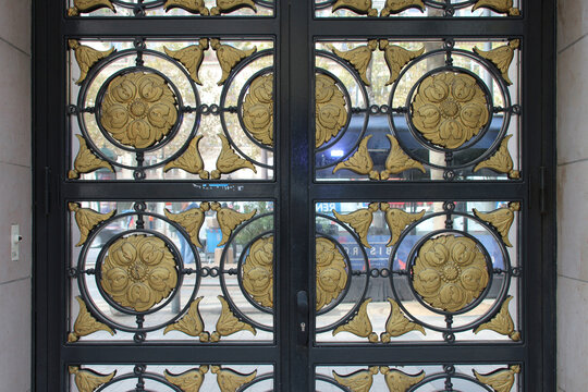 door of a mansion at the champs-&eacute;lys&eacute;es in paris (france)