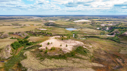 Fototapeta na wymiar Landscape of the forest-tundra and the sandy river bank, photo from quadrocopter, bird's eye view, beautiful ravines of unusual shape.Arctic Circle, tunda
