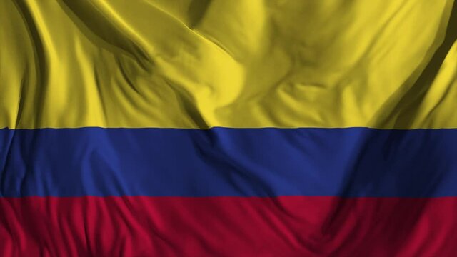 Flag of Colombia, fluttering in the wind. Seamless looping video. 3D rendering. It is different phases of the movement close-up flag in the wind. 4K, 3840x2160.