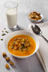 Pumpkin soup with cream and breadcrumbs