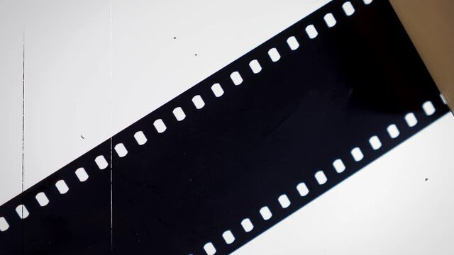 Super 35mm film on white background 