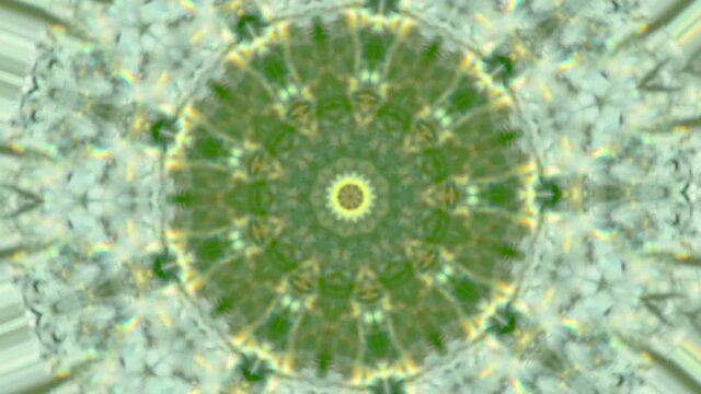 Video de m&aacute;ndala con patr&oacute;n de repetici&oacute;n de varios movimientos cambiantes en amarillo, verde y blanco