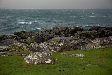 Ocean view from the rocky shore in the Faroe Islands.